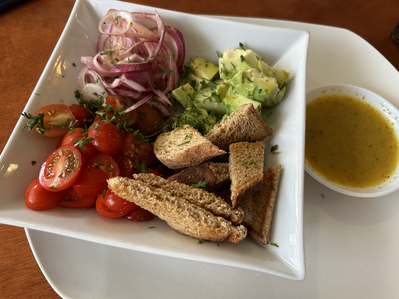 salad of tomato, avocado, and onion - My Veg serves vegan food in Baños Ecuador