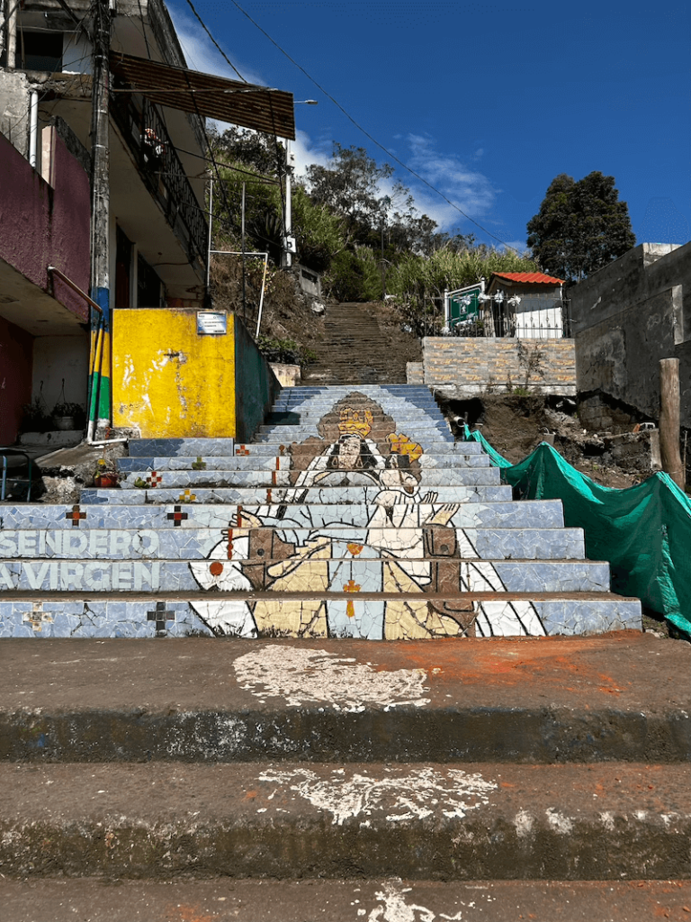 Colorful steps at the base of the El Virgen hike in Baños Ecuador